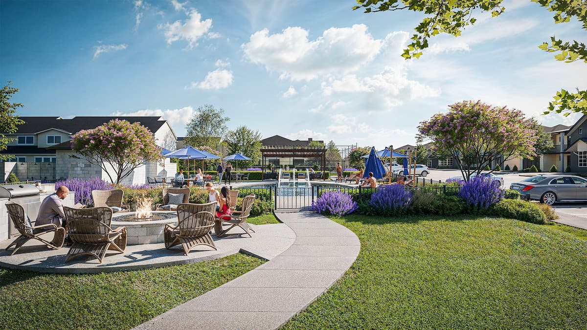 Scenic view of Minerva Heights community park with seating and blooming trees.
